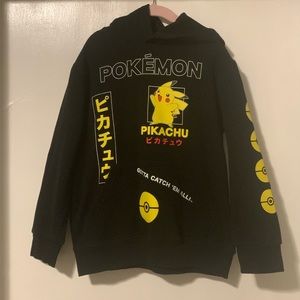 Black Pokémon pull over sweater.  Size small.